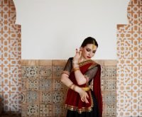 beautiful-young-woman-wearing-sari_23-2149502983